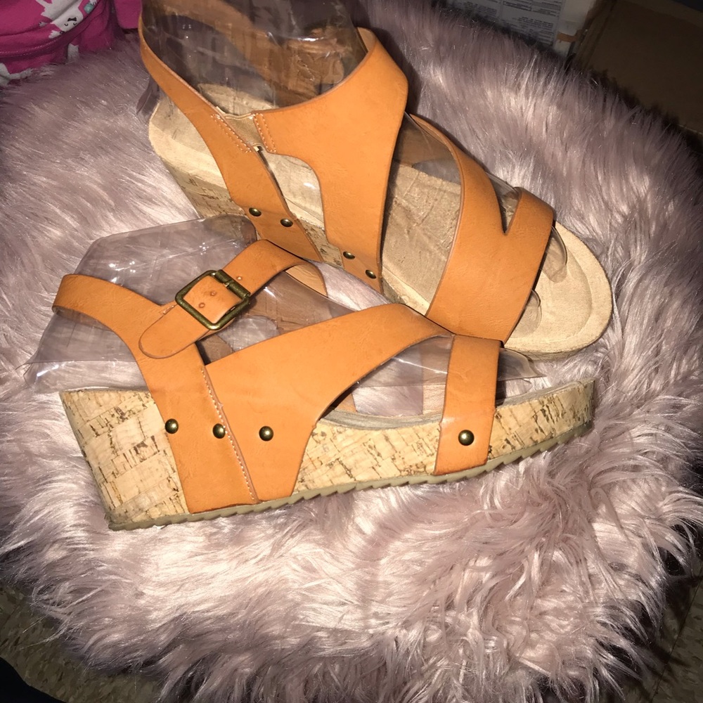 Women size 10 brown leather wedges